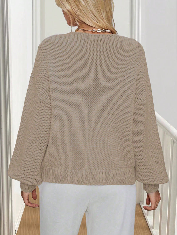 Frenchy cardigan de punto unicolor de color rosa palido con cinturon delantero, se puede usar sobre una camiseta