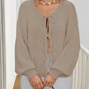 Frenchy cardigan de punto unicolor de color rosa palido con cinturon delantero, se puede usar sobre una camiseta