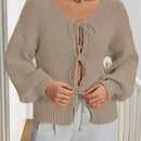 Frenchy cardigan de punto unicolor de color rosa palido con cinturon delantero, se puede usar sobre una camiseta
