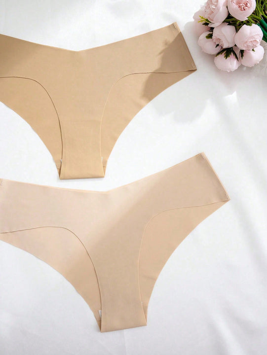 Set de 12 bragas adhesivas sin costuras de triangulo para damas en multiples colores