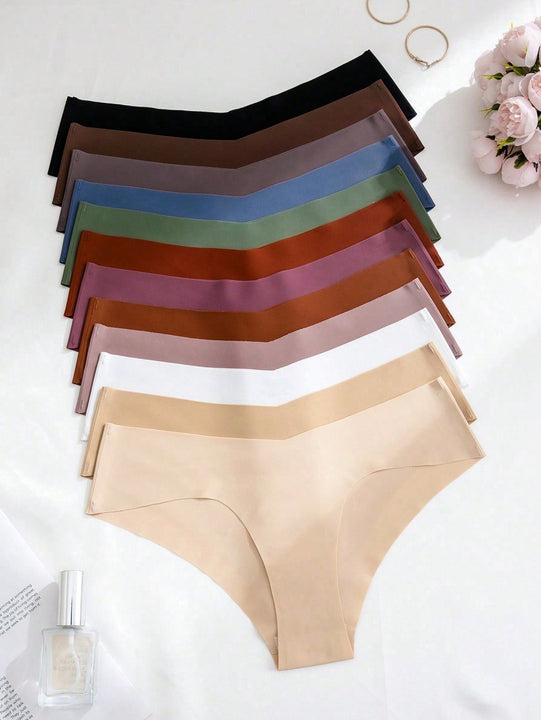 Set de 12 bragas adhesivas sin costuras de triangulo para damas en multiples colores