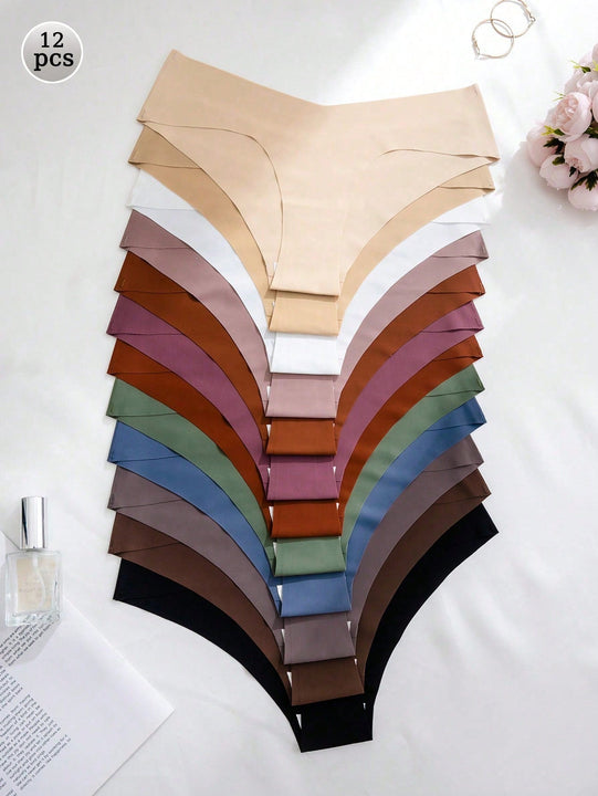 Set de 12 bragas adhesivas sin costuras de triangulo para damas en multiples colores