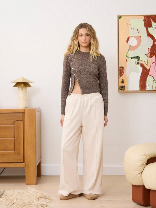 Aralina pantalon ancho estilo chandal con bolsillos y detalles de costura de pinzas