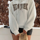 Ezwear sudadera holgada con capucha de felpa gruesa con estampado minimalista casual de leopardo y estrella en blanco para mujeres