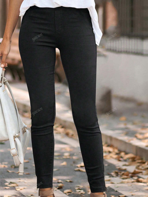 Pantalones casuales acortados de mujer de unicolor con bolsillos elasticos, con cremallera decorativa