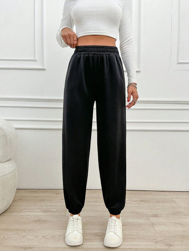 Pantalones jogger de mujer de bolsillo diagonal de unicolor