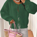 Frenchy cardigan de punto unicolor de color rosa palido con cinturon delantero, se puede usar sobre una camiseta