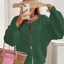 Frenchy cardigan de punto unicolor de color rosa palido con cinturon delantero, se puede usar sobre una camiseta