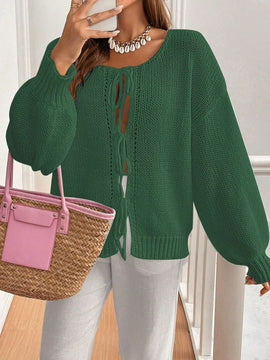 Frenchy cardigan de punto unicolor de color rosa palido con cinturon delantero, se puede usar sobre una camiseta