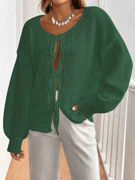 Frenchy cardigan de punto unicolor de color rosa palido con cinturon delantero, se puede usar sobre una camiseta