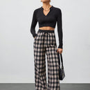 Tall pantalon holgado de diseno de textura casual versatil con estampado de cuadros blancos y negros en contraste