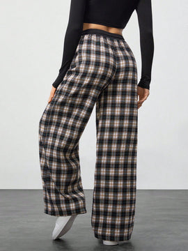 Tall pantalon holgado de diseno de textura casual versatil con estampado de cuadros blancos y negros en contraste