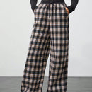 Tall pantalon holgado de diseno de textura casual versatil con estampado de cuadros blancos y negros en contraste