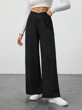 Tall pantalones anchos de pierna negros con envoltorio de cintura de unicolor para mujer