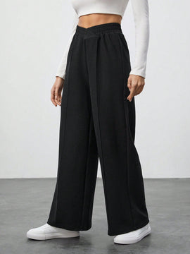 Tall pantalones anchos de pierna negros con envoltorio de cintura de unicolor para mujer