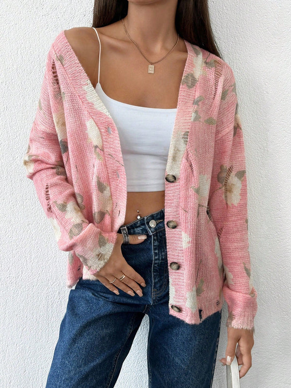 Tall cardigan casual con mangas largas, estampado floral y hombros caidos, rasgado, otono
