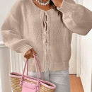 Frenchy cardigan de punto unicolor de color rosa palido con cinturon delantero, se puede usar sobre una camiseta