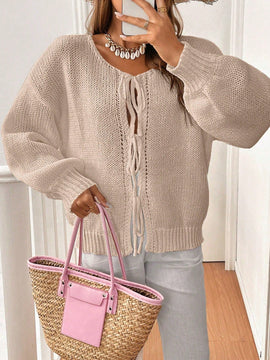 Frenchy cardigan de punto unicolor de color rosa palido con cinturon delantero, se puede usar sobre una camiseta