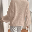 Frenchy cardigan de punto unicolor de color rosa palido con cinturon delantero, se puede usar sobre una camiseta