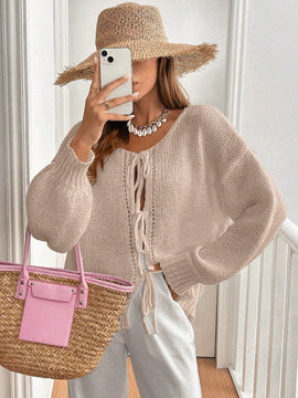 Frenchy cardigan de punto unicolor de color rosa palido con cinturon delantero, se puede usar sobre una camiseta
