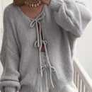 Frenchy cardigan de punto unicolor de color rosa palido con cinturon delantero, se puede usar sobre una camiseta