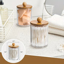 Un elegante accesorio de baño hecho de bambú transparente para guardar hisopos, con un asiento acolchado y libre de formaldehído.