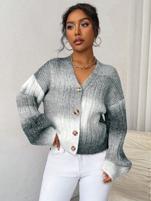 Relaxiva cardigan de punto con botones delanteros, manga larga, de color ombre, hecho de un hilado jaspeado y tejido de nervio