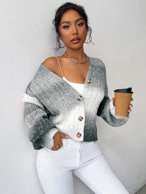 Relaxiva cardigan de punto con botones delanteros, manga larga, de color ombre, hecho de un hilado jaspeado y tejido de nervio
