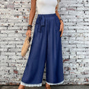 Nuevos pantalones sueltos con efecto denim, cintura elastica, lazo y bajo acampanado para mujer