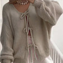 Frenchy cardigan de punto unicolor de color rosa palido con cinturon delantero, se puede usar sobre una camiseta