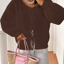 Frenchy cardigan de punto unicolor de color rosa palido con cinturon delantero, se puede usar sobre una camiseta