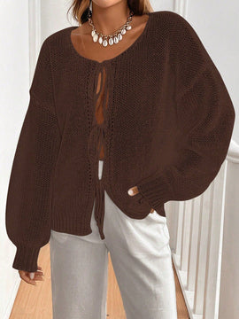 Frenchy cardigan de punto unicolor de color rosa palido con cinturon delantero, se puede usar sobre una camiseta