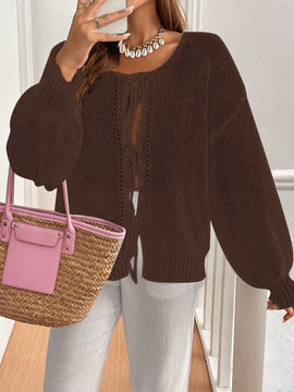 Frenchy cardigan de punto unicolor de color rosa palido con cinturon delantero, se puede usar sobre una camiseta
