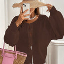 Frenchy cardigan de punto unicolor de color rosa palido con cinturon delantero, se puede usar sobre una camiseta