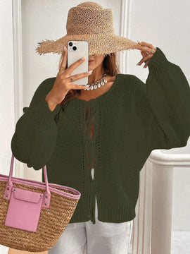Frenchy cardigan de punto unicolor de color rosa palido con cinturon delantero, se puede usar sobre una camiseta