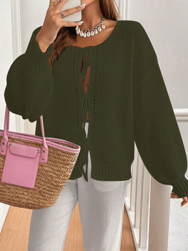 Frenchy cardigan de punto unicolor de color rosa palido con cinturon delantero, se puede usar sobre una camiseta