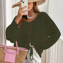 Frenchy cardigan de punto unicolor de color rosa palido con cinturon delantero, se puede usar sobre una camiseta