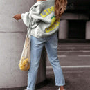 Chaqueta corta de cardigan casual de manga larga con botones y estampado de limon oversize para mujer en otono e invierno