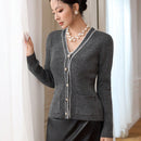 Modely cardigan de punto de color contrastante con bolsillos y botones para mujer para uso diario