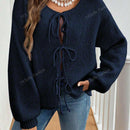 Cardigan de punto de color liso con detalle de nudo delantero, de estilo minimalista para uso en la oficina, atemporal y femenino. cardigan de punto en un solo color con abertura frontal que se puede usar sobre blusas, un cardigan oversize y adorable