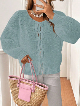Frenchy cardigan de punto unicolor de color rosa palido con cinturon delantero, se puede usar sobre una camiseta