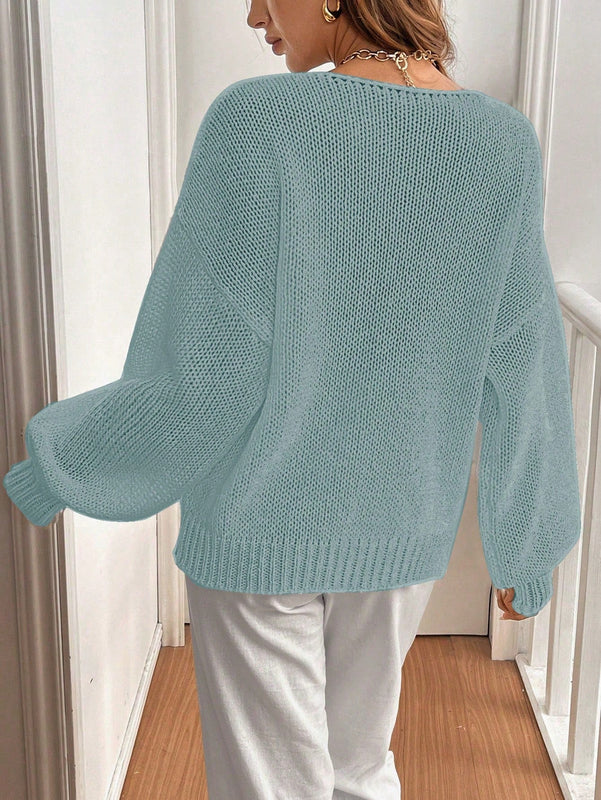 Frenchy cardigan de punto unicolor de color rosa palido con cinturon delantero, se puede usar sobre una camiseta