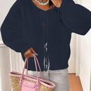 Frenchy cardigan de punto unicolor de color rosa palido con cinturon delantero, se puede usar sobre una camiseta
