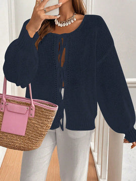 Frenchy cardigan de punto unicolor de color rosa palido con cinturon delantero, se puede usar sobre una camiseta