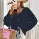 Frenchy cardigan de punto unicolor de color rosa palido con cinturon delantero, se puede usar sobre una camiseta