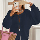 Frenchy cardigan de punto unicolor de color rosa palido con cinturon delantero, se puede usar sobre una camiseta