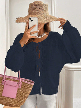 Frenchy cardigan de punto unicolor de color rosa palido con cinturon delantero, se puede usar sobre una camiseta