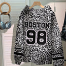 Muchic sudadera con capucha con estampado de leopardo minimalista informal, impreso en toda la prenda, otono invierno
