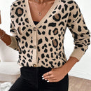 Essnce cardigan informal con botones al frente y hombros caidos con estampado de leopardo, apropiado para otono/invierno