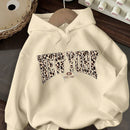 Ezwear sudadera holgada con capucha de felpa gruesa con estampado minimalista casual de leopardo y estrella en blanco para mujeres